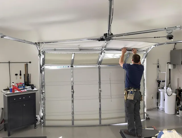 Glastonbury Garage Door Repair specialist performing precise section replacement on Glastonbury garage door