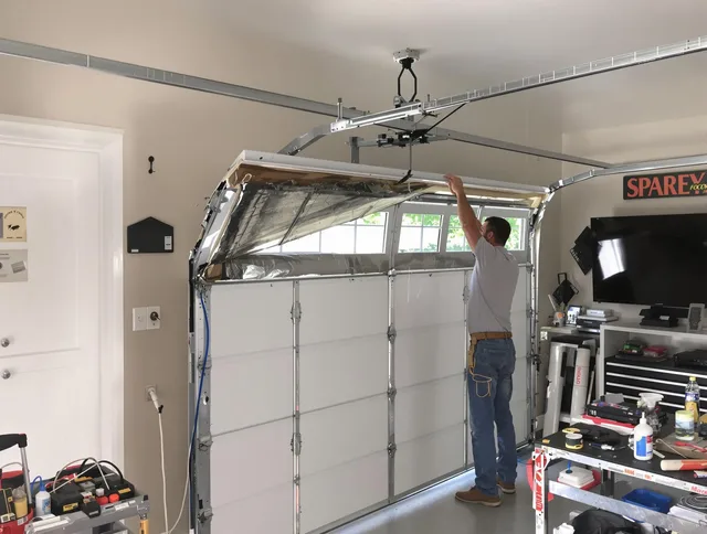 Garage door section replacement by Glastonbury Garage Door Repair in Glastonbury