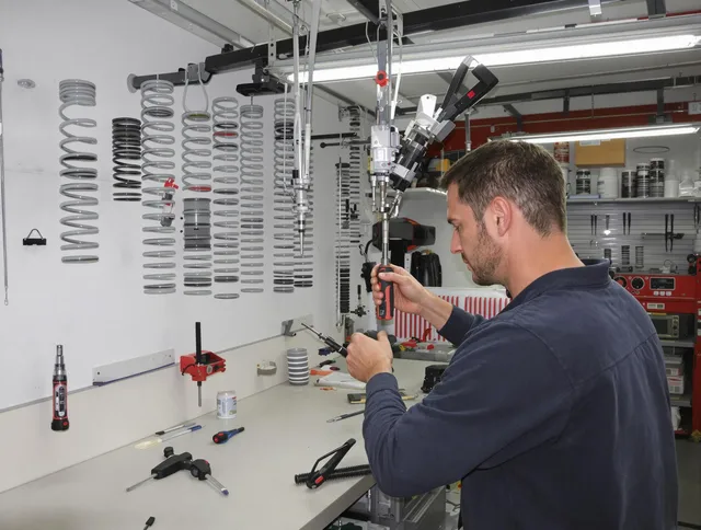 Glastonbury Garage Door Repair safety certified technician performing precision spring replacement in Glastonbury