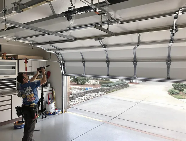Garage door track repair service by Glastonbury Garage Door Repair in Glastonbury